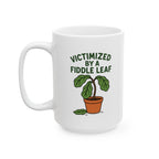 Victimized by a Fiddle Leaf Ceramic Mug (15 oz)